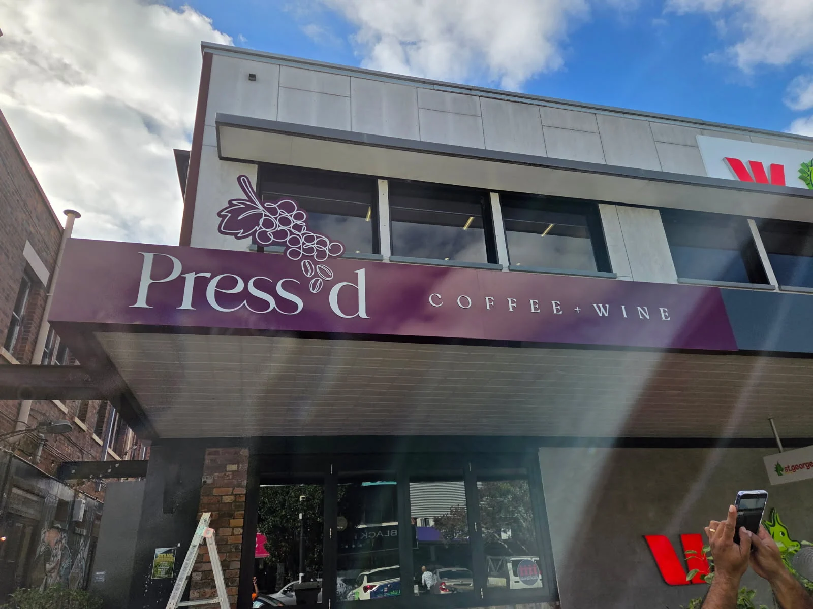 Press'd Coffee & Wine logo on the shopfront fascia, Toowoomba
