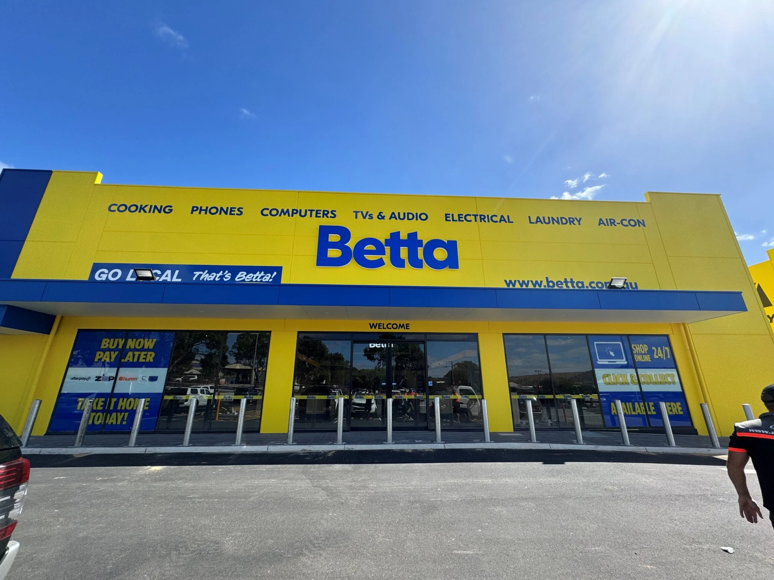 Betta shopfront in yellow and blue